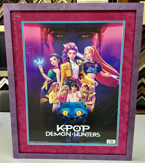 Custom framed KPop Demon Hunters poster with pink suede matting and purple frame