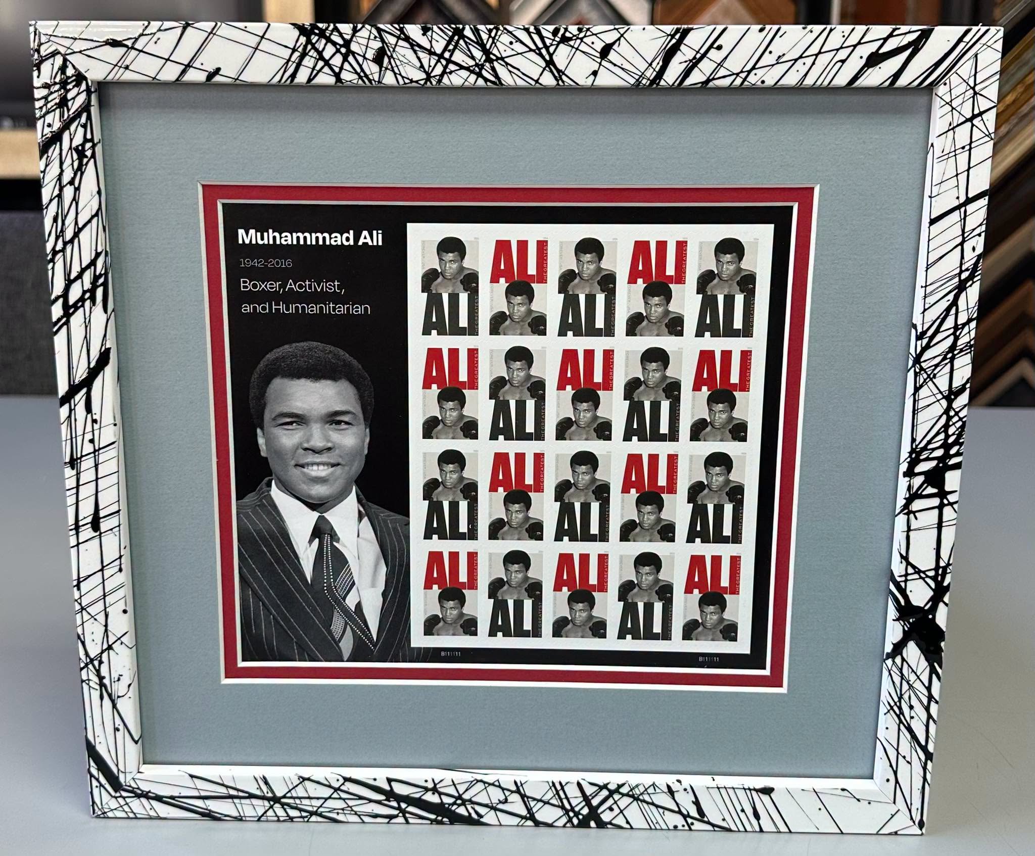 Custom framed Muhammad Ali with decorative black and white frame