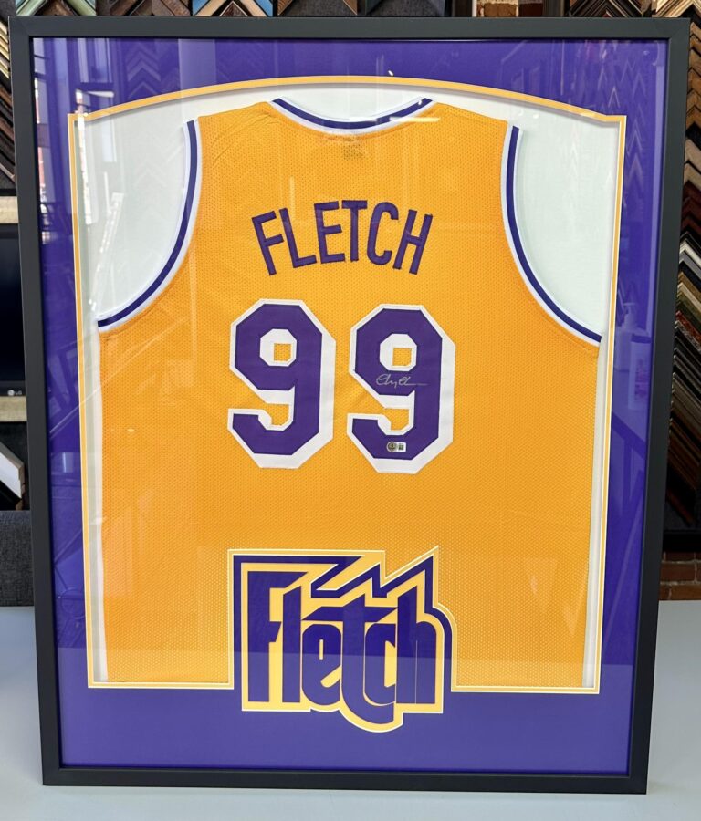 Custom framed Los Angeles Lakers jersey signed by Byron Scott with team graphics