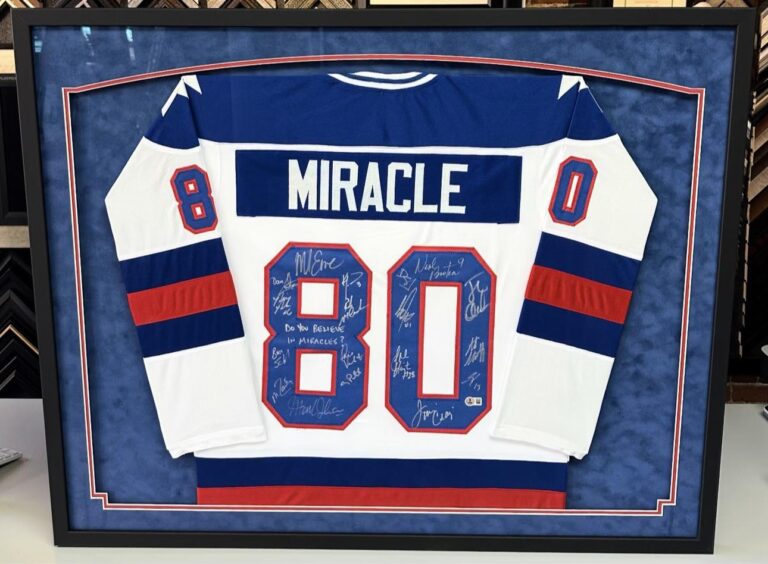 Custom framed Miracle on Ice USA hockey jersey signed by team members