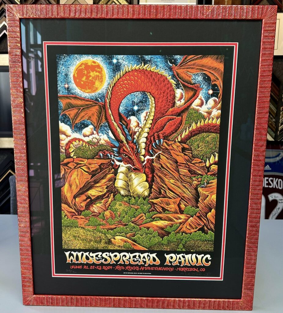 Custom framed Widespread Panic limited-edition Red Rocks concert poster with a vivid red dragon design, double matting and a decorative red frame