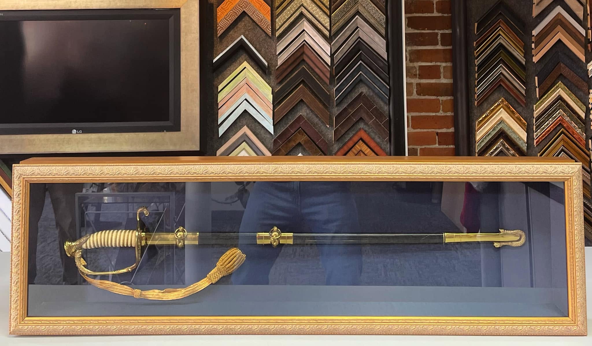 Custom shadowbox framing for ceremonial sword and military memorabilia