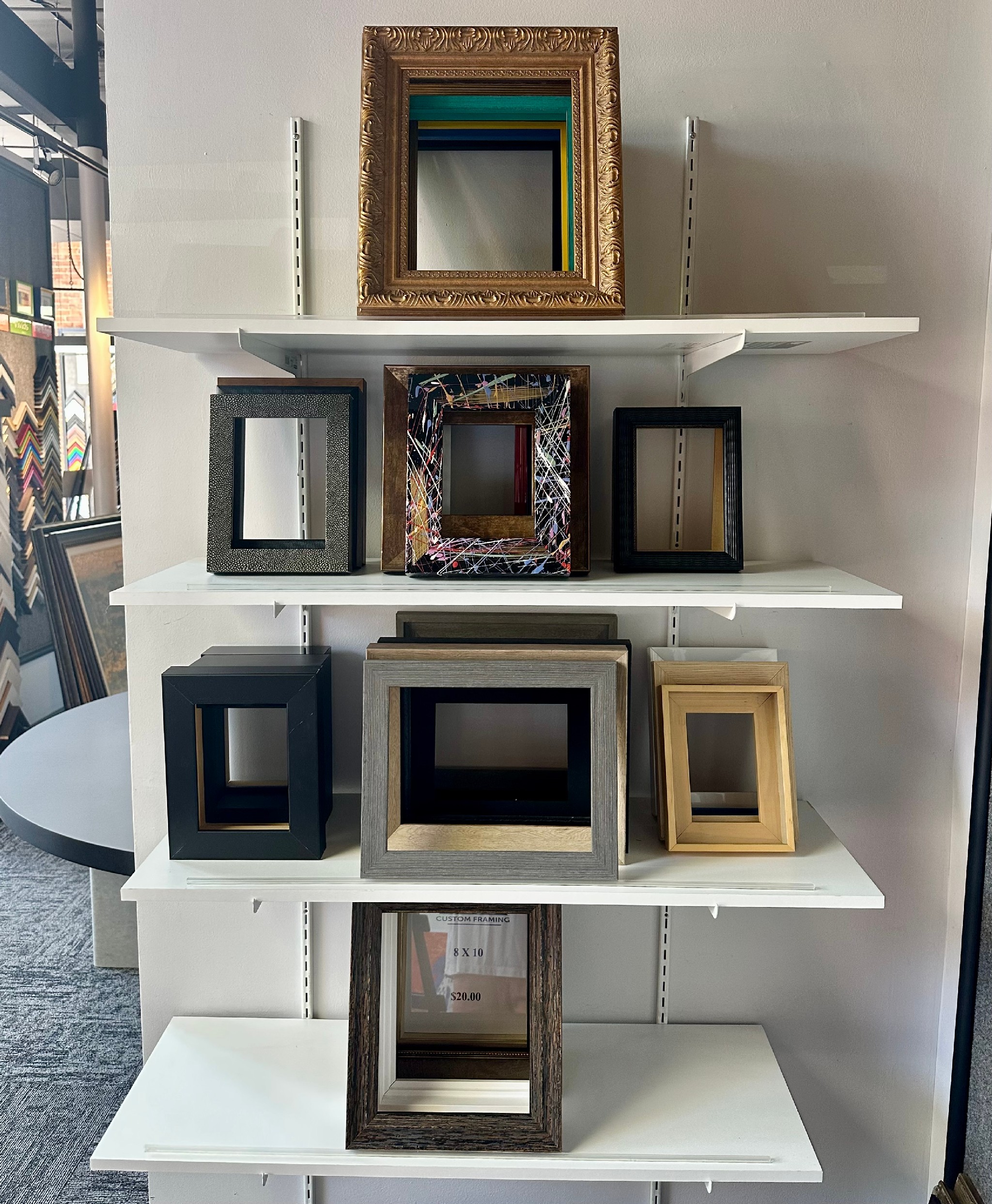 Display of handcrafted custom framed mirrors in a variety of sizes, colors and styles available for homes and businesses
